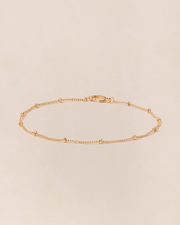 Le bracelet chaîne boules 18cm doré à l'or fin 24 carats